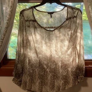 Daisy Fuentes animal print blouse.